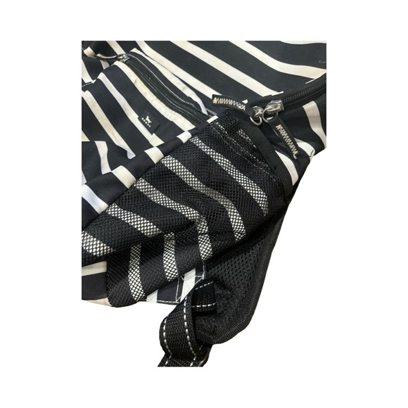 Scout Black and white backpack made with poly canvas
Wipe clean with damp towel - Picture 9 of 16